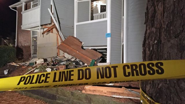 Car crashes into Raleigh apartment; driver charged with hit-and-run