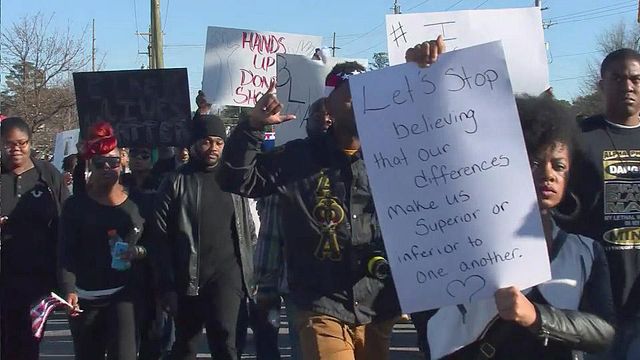 Fayetteville protesters march in unity