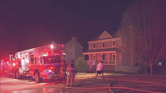 Neighbors help kids in Raleigh house fire