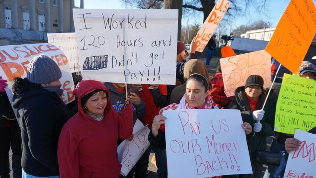 Custodial workers for Durham schools receive back pay