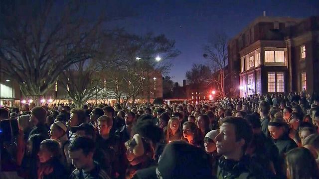 Vigil for slain students attended by thousands