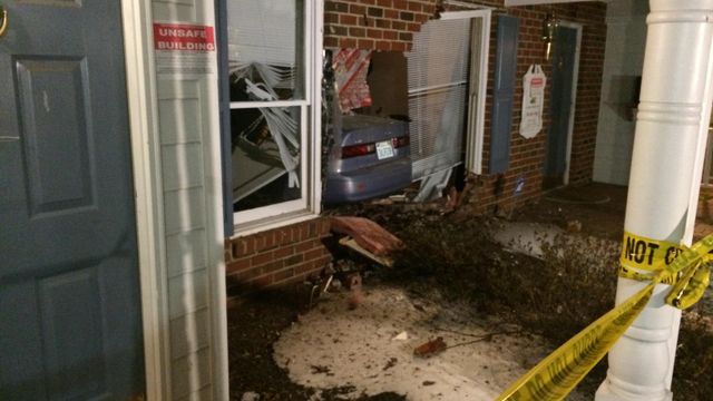 Car crashes into Raleigh office building