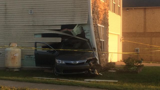 Woman faces DWI charge after driving into Durham home