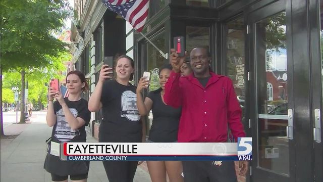 Families of those killed in police custody march in Fayetteville