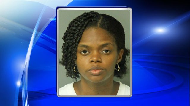 Woman charged in death of infant son