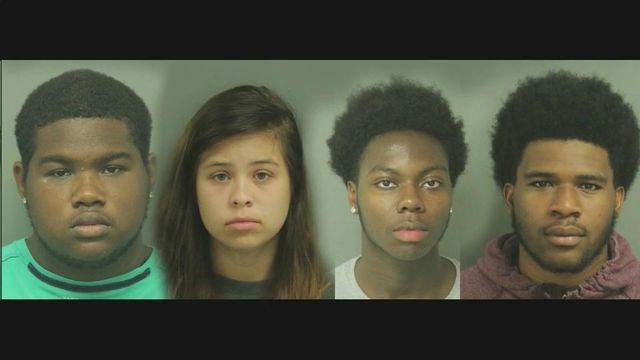 Four charged in fatal hit-and-run