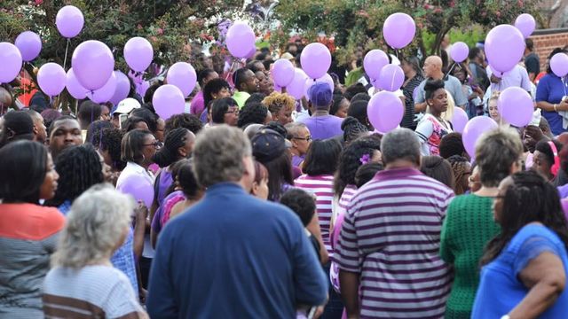Friends, family gather to remember domestic violence victim