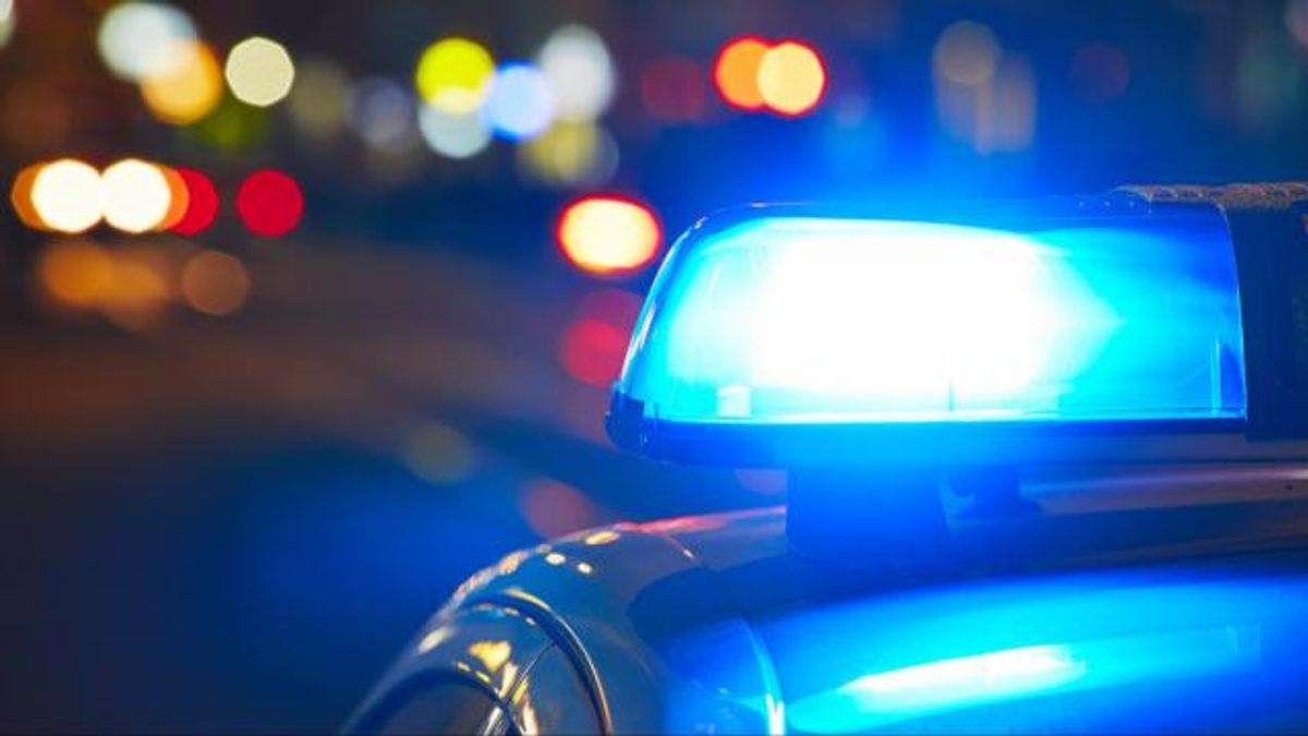 Police car, blue lights, at night