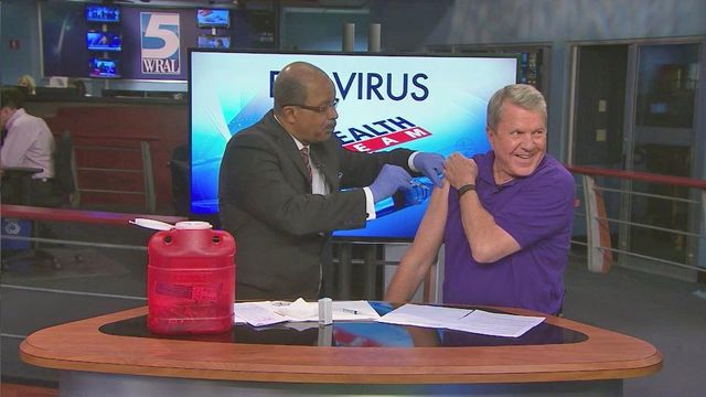 David Crabtree gets a flu shot on live TV
