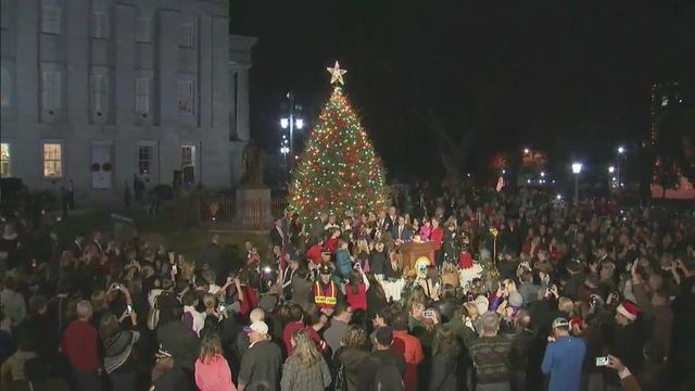 Official state Christmas tree aglow at Capitol building
