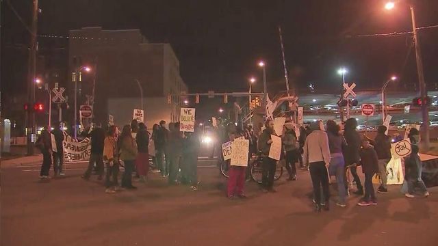 Protestors gather outside DPAC during performance