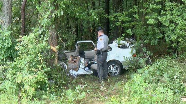 Man pinned in car, rescued from woods in Selma