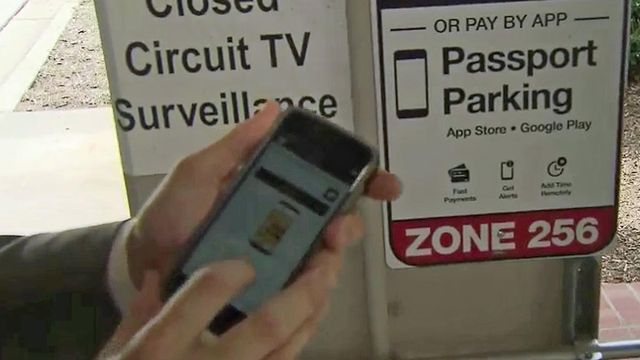 New app pays for parking with a press