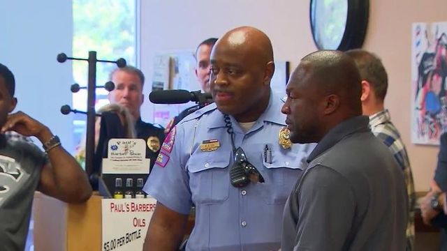 Barber invites police into shop for conversation