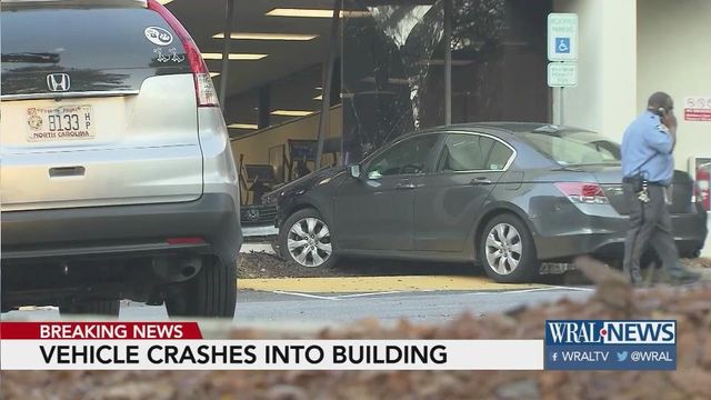 No injuries reported after car crashes into Raleigh building