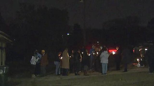 Vigil unites police with families of suspect, victim in Fayetteville stabbing