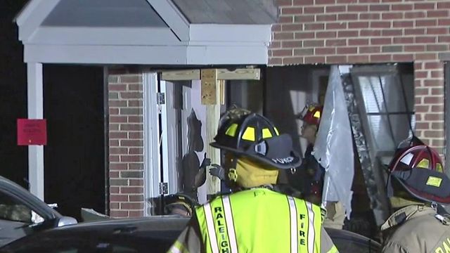 Car removed after crashing into Raleigh apartment