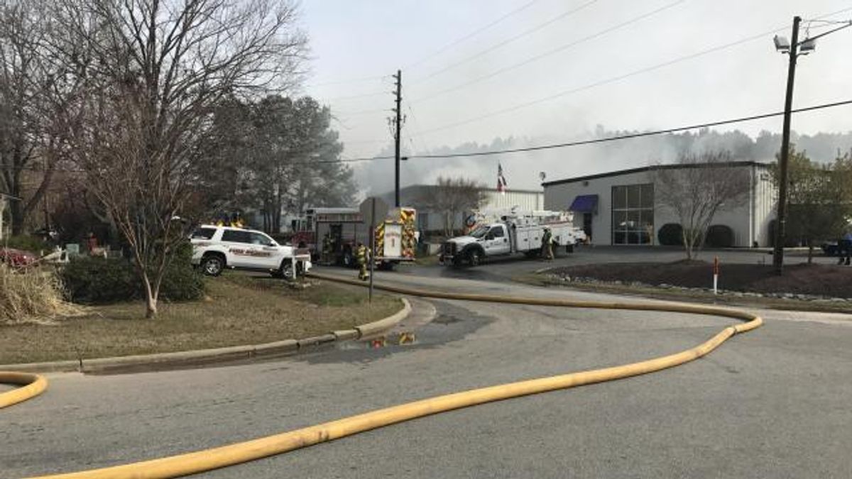 Firefighter injured while battling flames at Garner auto repair shop