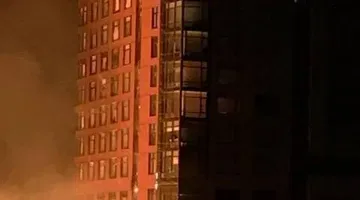 Windows melt, crane crashes as flames soar