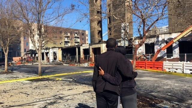 Downtown residents enter apartments for first time since fire