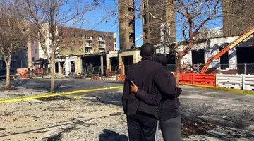 Downtown residents enter apartments for first time since fire