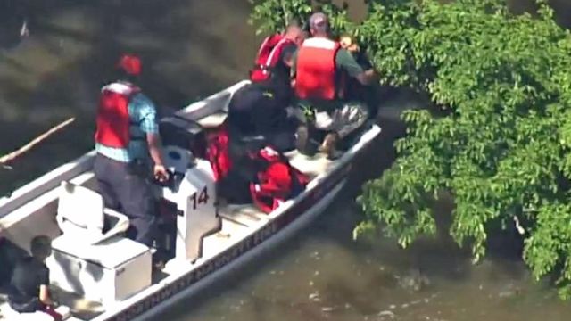 Mother, son shared prayers while awaiting rescue from river 