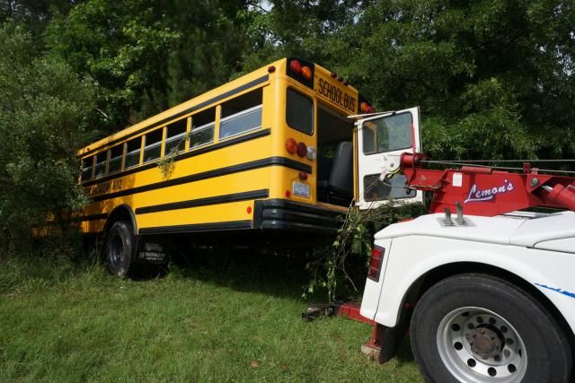 School bus crashes into Cary woods after driver has medical emergency; no kids injured 