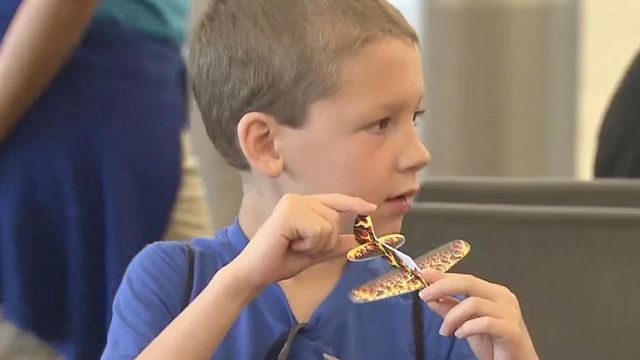 Practice flight helps children with autism, families cope with traveling 