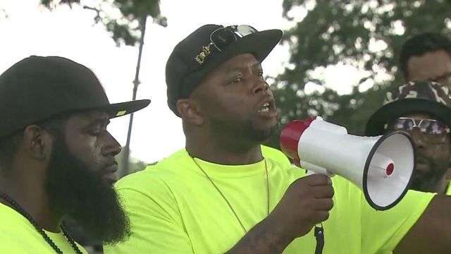 Residents rally to fight violence at McDougald Terrace 