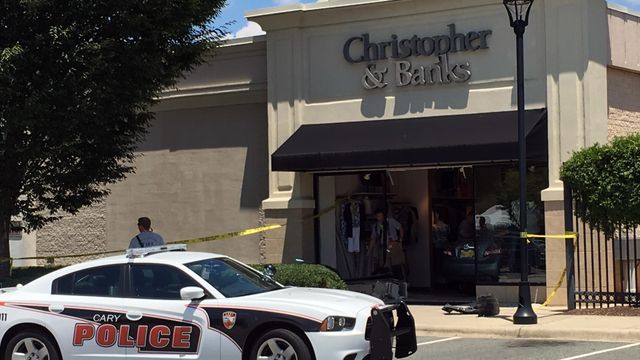 No one hurt when car slams into Cary store