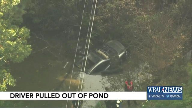 Officials: Crews flip submerged car to rescue 19-year-old driver