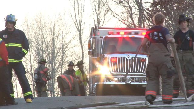 Crews battle Durham house fire