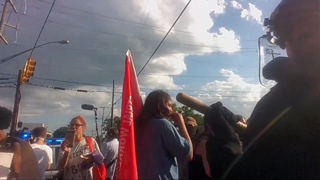 Bodycam video shows police pushing back protesters