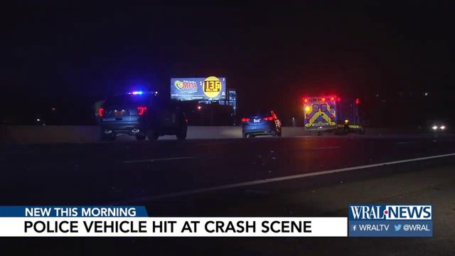 Woman on I-440 crashes into stopped Raleigh police car