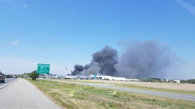 Firefighters responding to multiple-alarm industrial fire in Goldsboro