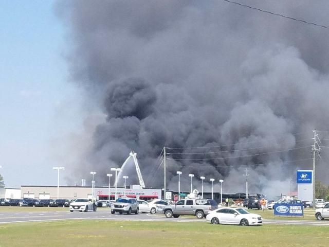 Firefighters responding to multiple-alarm industrial fire in Goldsboro