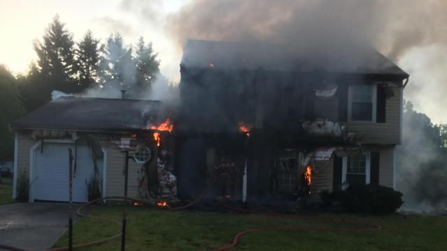 Woman trapped in Durham house fire
