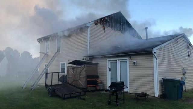 Woman trapped in Durham house fire
