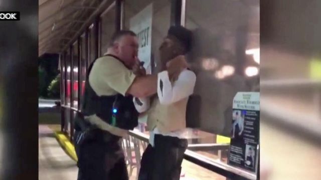 Officer's actions questioned after video shows man in choke hold