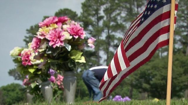 Army veteran walks cemeteries, places flags on graves to honor fallen soldiers