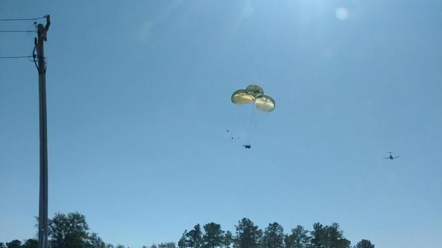 Military plane loses load