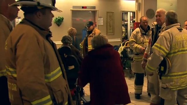 Investigators search for cause of high-rise fire