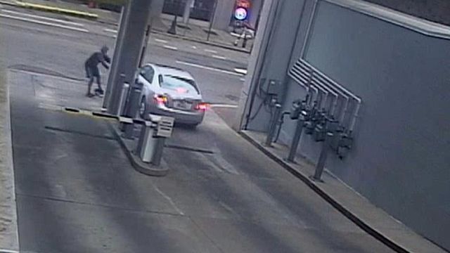 Raw: Bird scooter crashes into car leaving parking garace