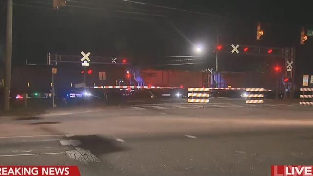Stalled train blocks traffic near fairgrounds