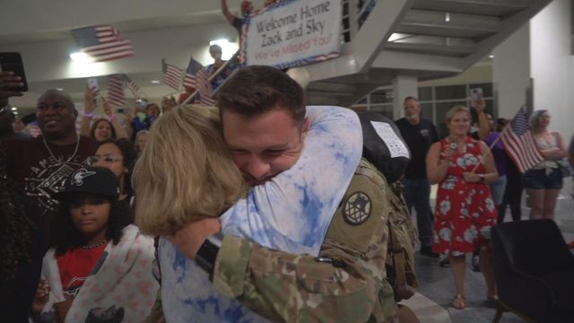 Raw: Family greets soldiers at RDU on Father's Day