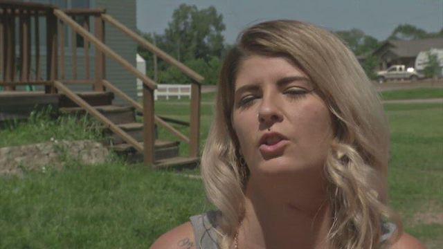 Woman warns others after being cut on throat from item shot out of lawn mower