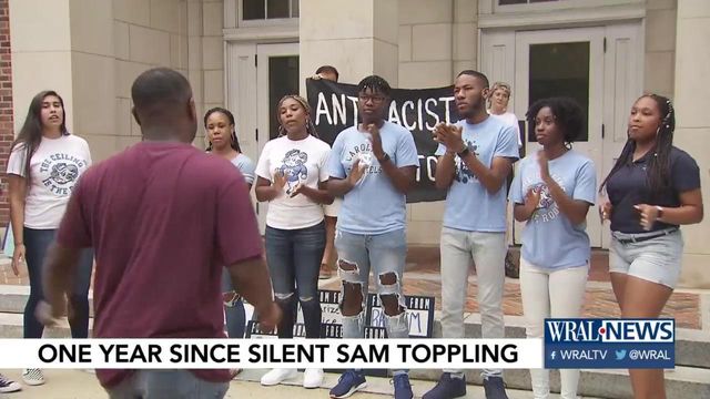 People come together to sing, make speeches one year after Silent Sam toppling