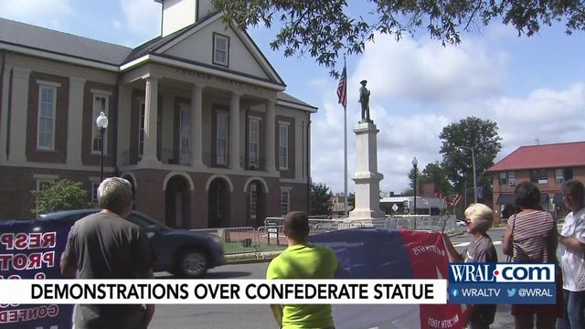 Protesters gather, argue for, against removal of Confederate statue