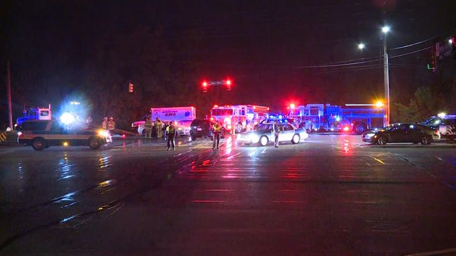 First responders cut doors off of car after crash