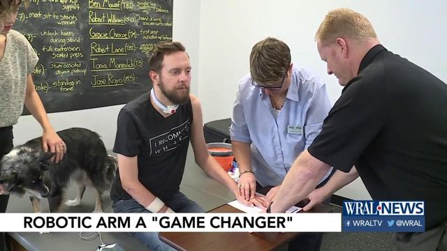 Technology helps Michael Thor regain partial movement via robotic arm